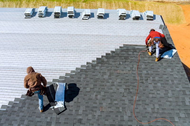 Shingle Layers Being Applied
